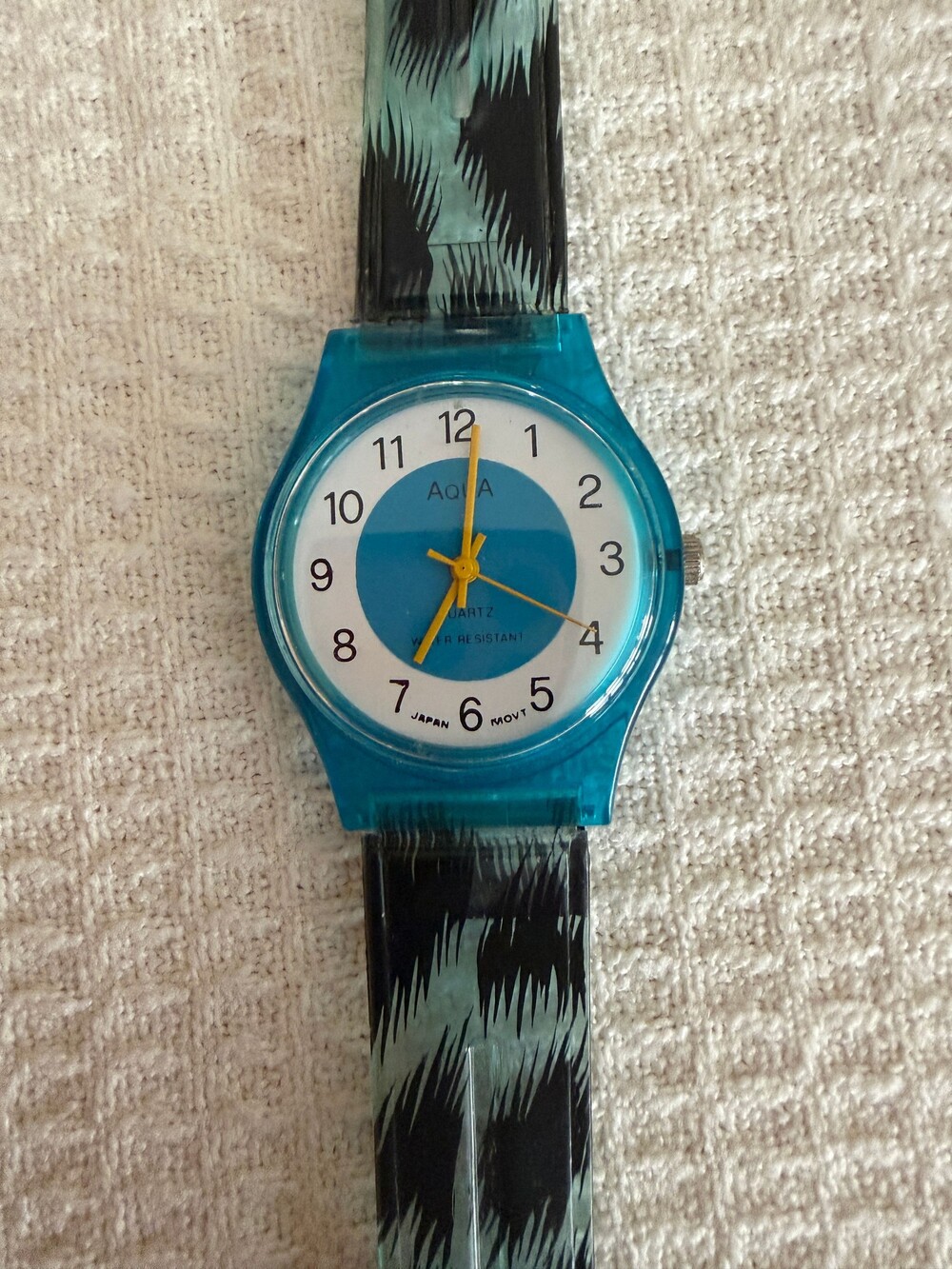 Aqua Water Resistant Blue Plastic Watch with Black and Teal Animal Print Band